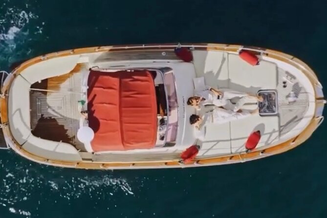Private Tour of the Island of Capri by Boat and Visit to the Caves - Punta Carena lighthouse and the coast near Tiberius