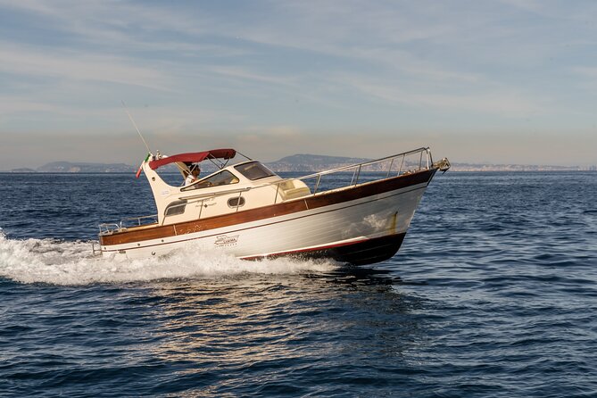Private Tour to Capri & Positano from Sorrento Classic Gozzo 850 - Passing through the Faraglioni