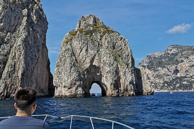 Shared boat tour from Sorrento to discover Capri - Punta Carena lighthouse and the Green Grotto