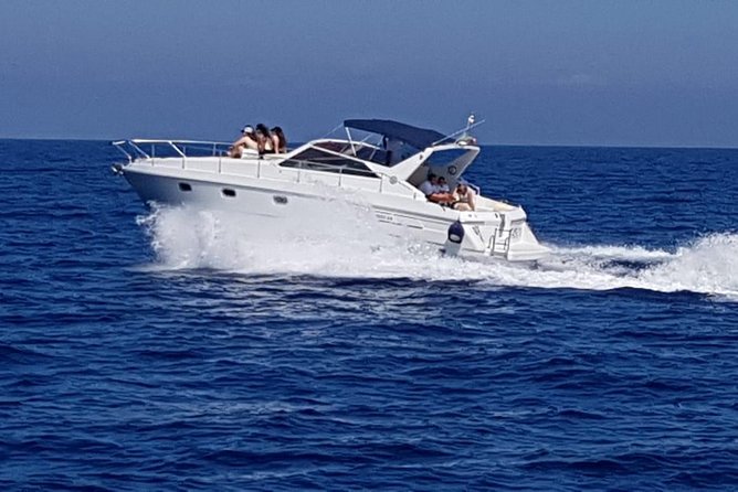 Shared boat tour from Sorrento to discover Capri - The Faraglioni, Natural Arch, and sea caves