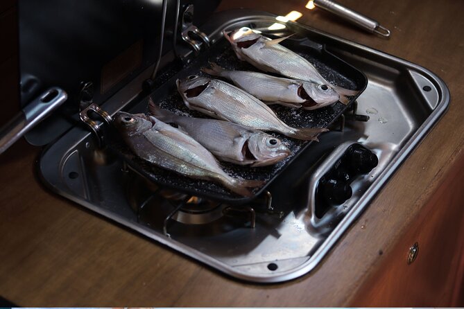 Shared trip with fishing and visit the beauty of Capri island - Lunch With the Day’s Catch