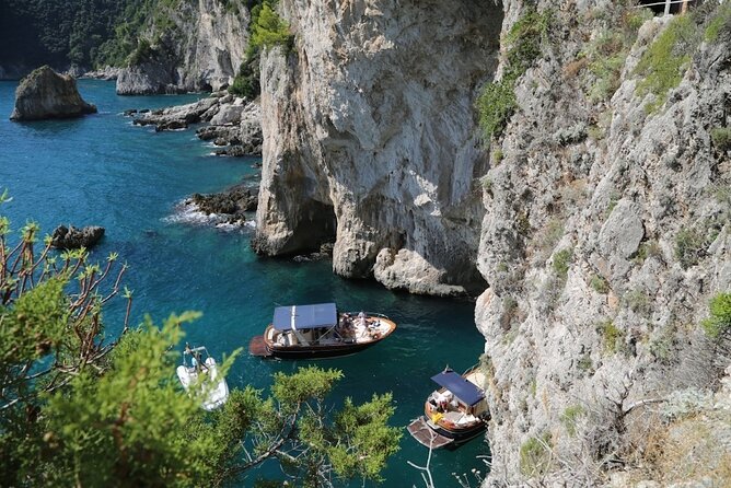 Small Group Boat Tour Capri & Blue Grotto with Swimming Stops - Guides, music, and the feel on board