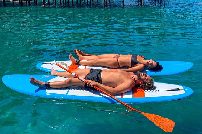 Small group paddle boarding tour to Bagni Regina Giovanna - From Marina Grande to Punta del Capo