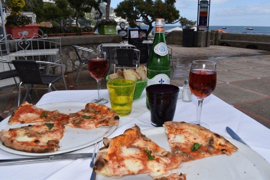 Sorrento and Amalfi Coast Small Group Tour by Boat - Leaving Sorrento and passing Marina Grande