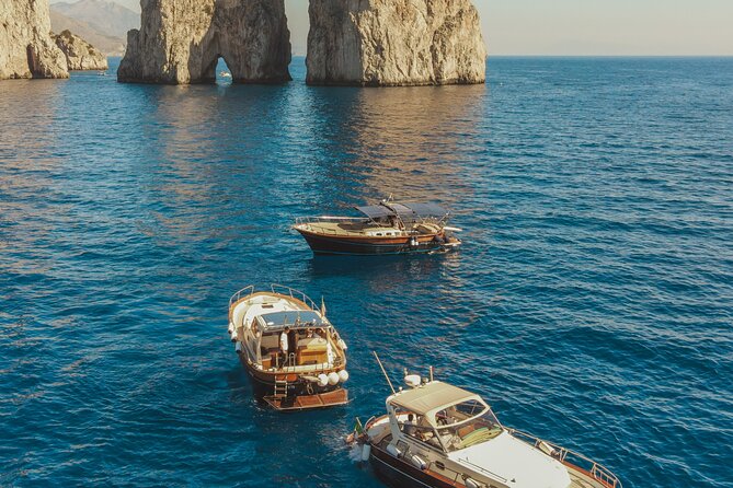 Sorrento: Capri Boat Small Group Tour Up to 8 & 4 hours ashore - Capri’s famous Faraglioni Rocks from the water