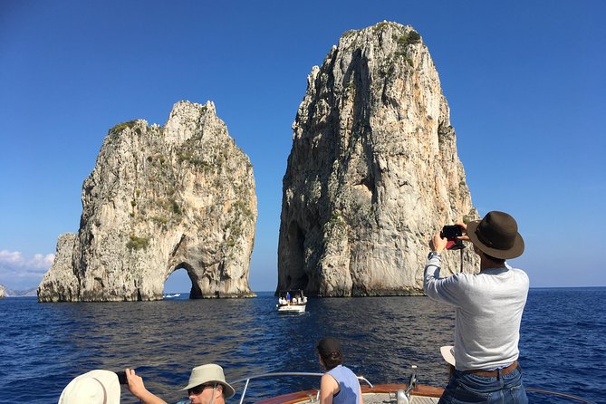 Sorrento: Capri Select Boat Trip with Swim, Drinks & Pick Up - Anacapri lighthouse and the Green Grotto