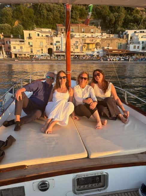 Sorrento Sunset Cruise with Aperitif on Board - Puolo Beach and Massa Lubrense at golden hour