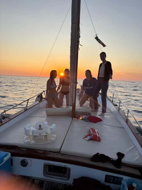 Sorrento Sunset Cruise with Aperitif on Board - Drinks, snacks, music, and the onboard mood