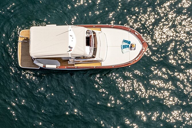 Sunset Private Boat Tour Experience in Positano - What is included aboard, and what to ask for