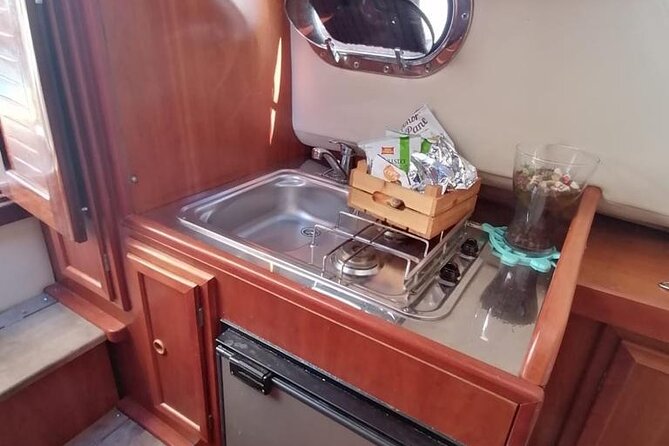 Three Hour Private Guided Tour of Capri with a luxury Gozzo cabin cruiser - The Faraglioni photo stop